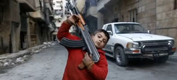 El e Ahmed, un copil de 8 ani care lupta in razboiul civil din Siria